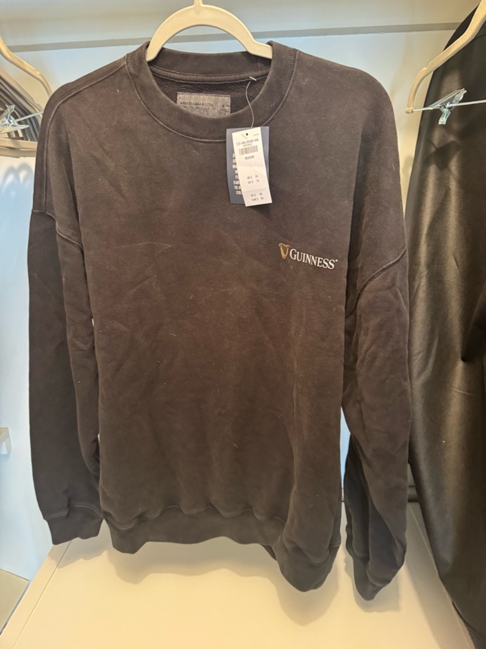 Guinness Black Crewneck Sweatshirt with Gold Logo